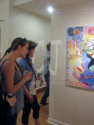 Viewers at Andy Warhol and Marylin mixed media by Christina Jamrolinski